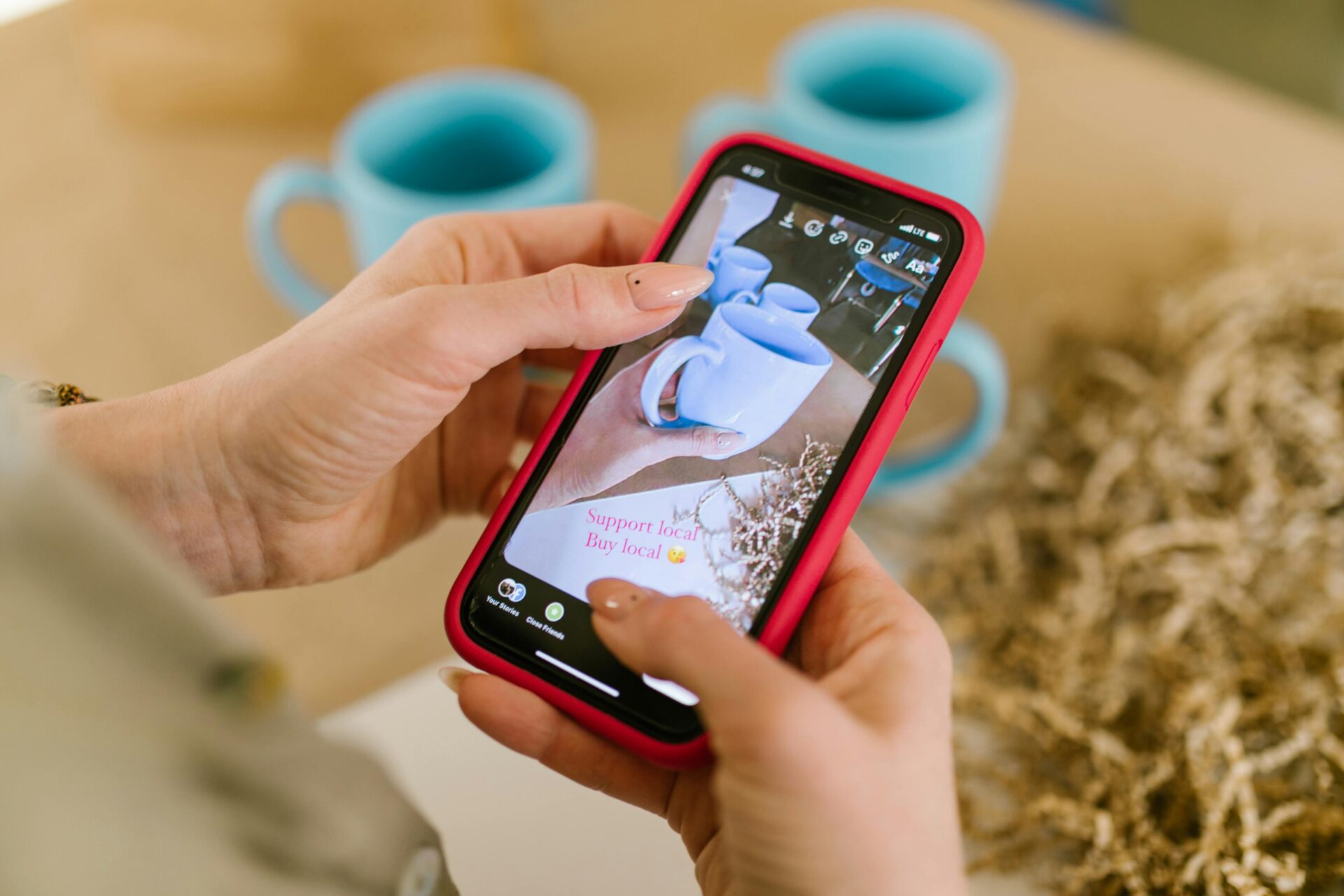 Image of Ceramic Cups on Smartphone Screen Image of Ceramic Cups on Smartphone Screen<br />